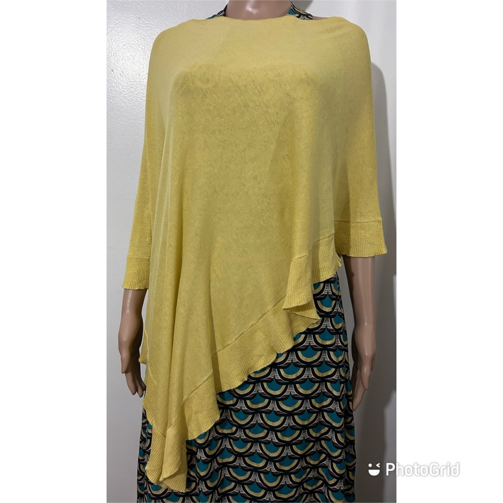 BCBG MAXAZRIA asymmetrical cover poncho. Sits on the shoulders, open under.